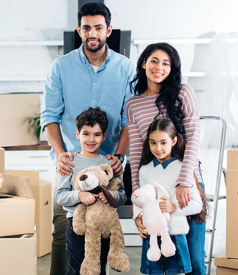 Happy family in their new home